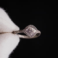 Studio detail of medieval silver ring Ruslan highlighting lozenge bezel and hatched border