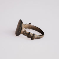 Three-quarter view of Byzantine bronze ring Theodulos revealing shoulder architecture