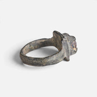Medieval bronze ring 'Aldonza' shows its raised setting edge and broad hoop from the side.