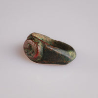 Three-quarter view of Roman bronze ring Corvinus showing bird engraving detail