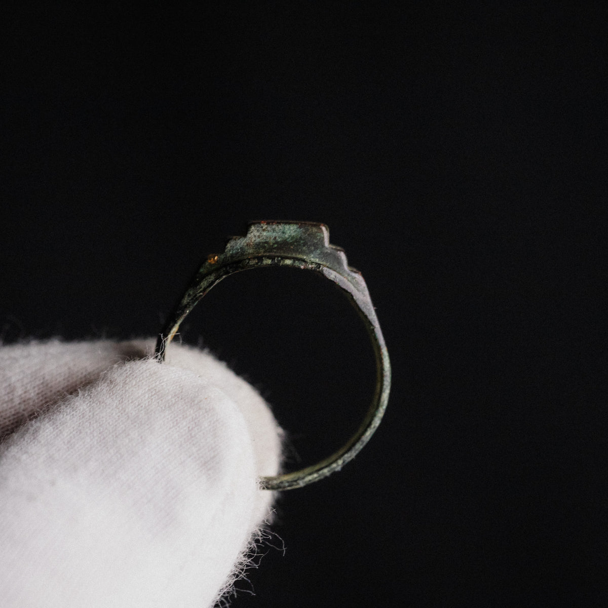 Top-down view of Byzantine bronze ring Aetheria showing stepped bezel silhouette