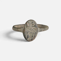 Byzantine bronze ring 'Kassia' shows the worn figure on its oval bezel from the front.