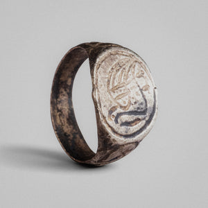 Top-down view of medieval silver ring 'Yaroslava' showing oval bezel with bird motif and border