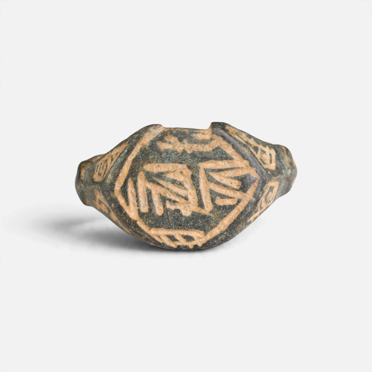 Medieval Islamic bronze ring 'Nasirun' shows angular engraved strokes within the border of its bezel from the front.