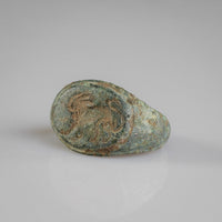 Top-down view of Roman bronze ring Leonis with fully visible engraved lion