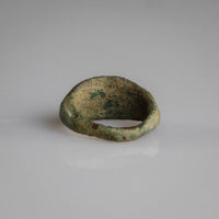 Top-down view of Roman bronze ring Numerius with worn integral bezel