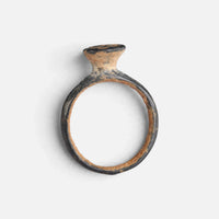 Byzantine bronze ring 'Peristerios' shows the raised bezel neck above its complete hoop in profile.