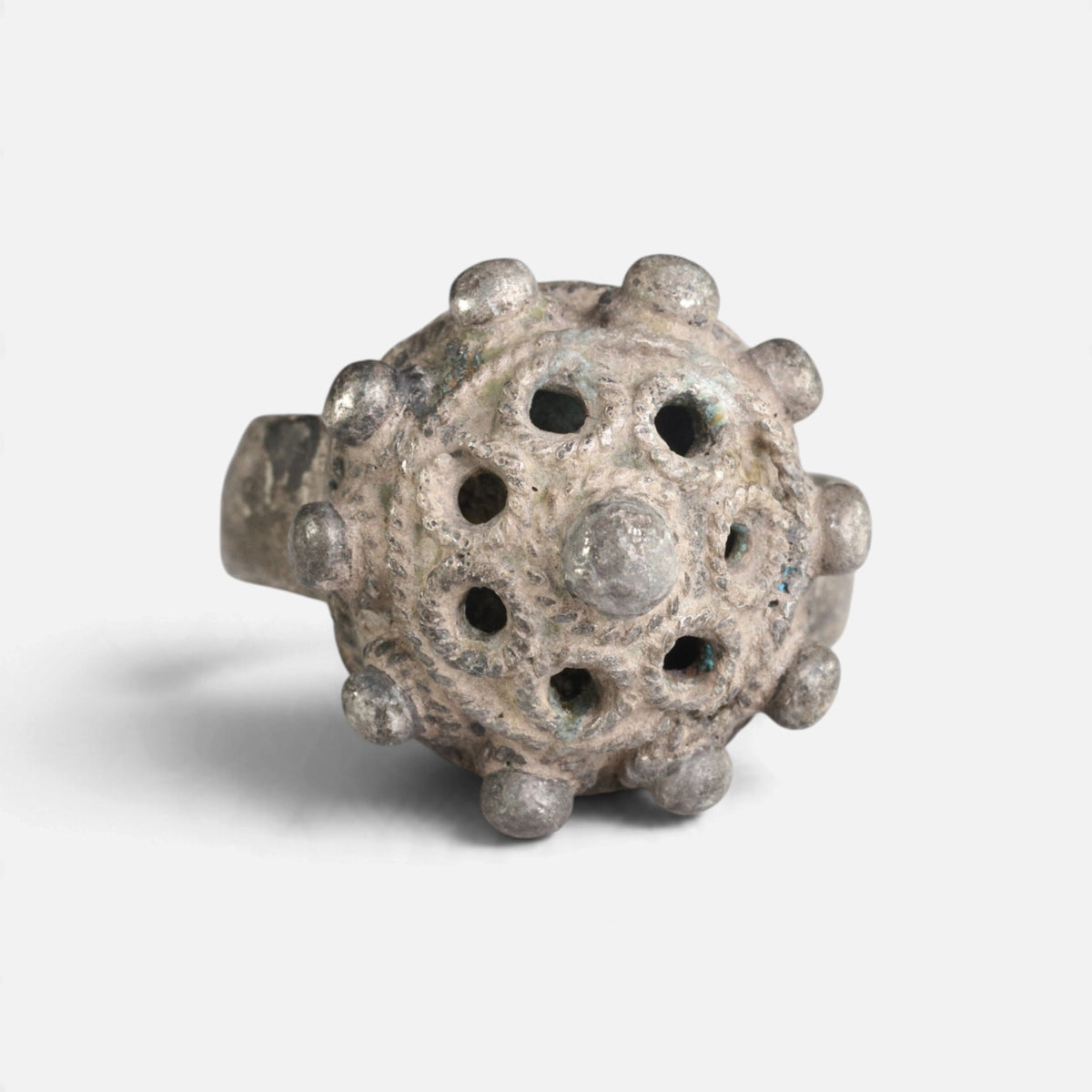 Byzantine silver ring 'Thalios' shows the openings and rounded bosses of its domed bezel from the front.