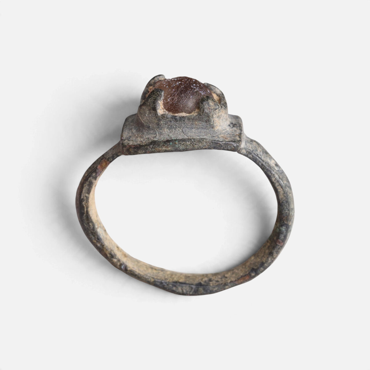 Medieval bronze ring 'Aldonza' shows its raised setting above the complete hoop in profile.