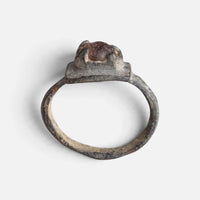 Medieval bronze ring 'Aldonza' shows its raised setting above the complete hoop in profile.