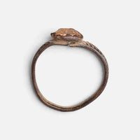 Medieval bronze ring 'Luminara' shows its raised setting edge above the complete hoop in profile.