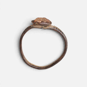 Medieval bronze ring 'Luminara' shows its raised setting edge above the complete hoop in profile.