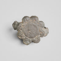 Top view of medieval bronze ring Rosalind revealing the flower-shaped bezel outline