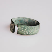Top view of medieval bronze ring Vesna showing symmetrical terminal decoration and gap