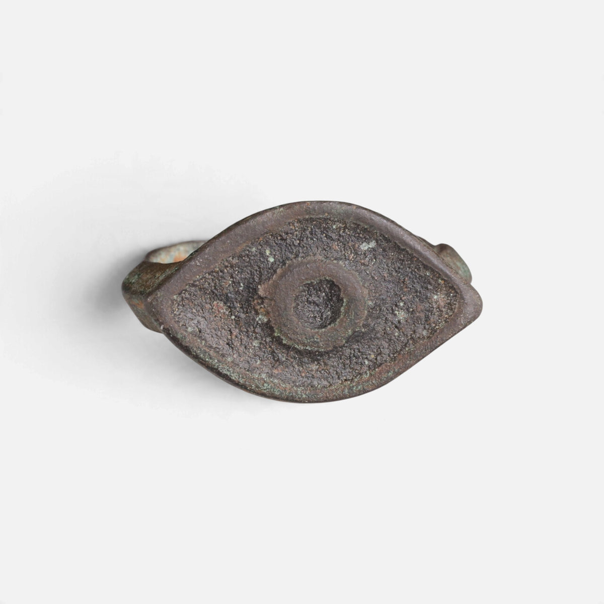 Roman bronze ring 'Catulla' shows concentric circular decoration within its pointed oval bezel.